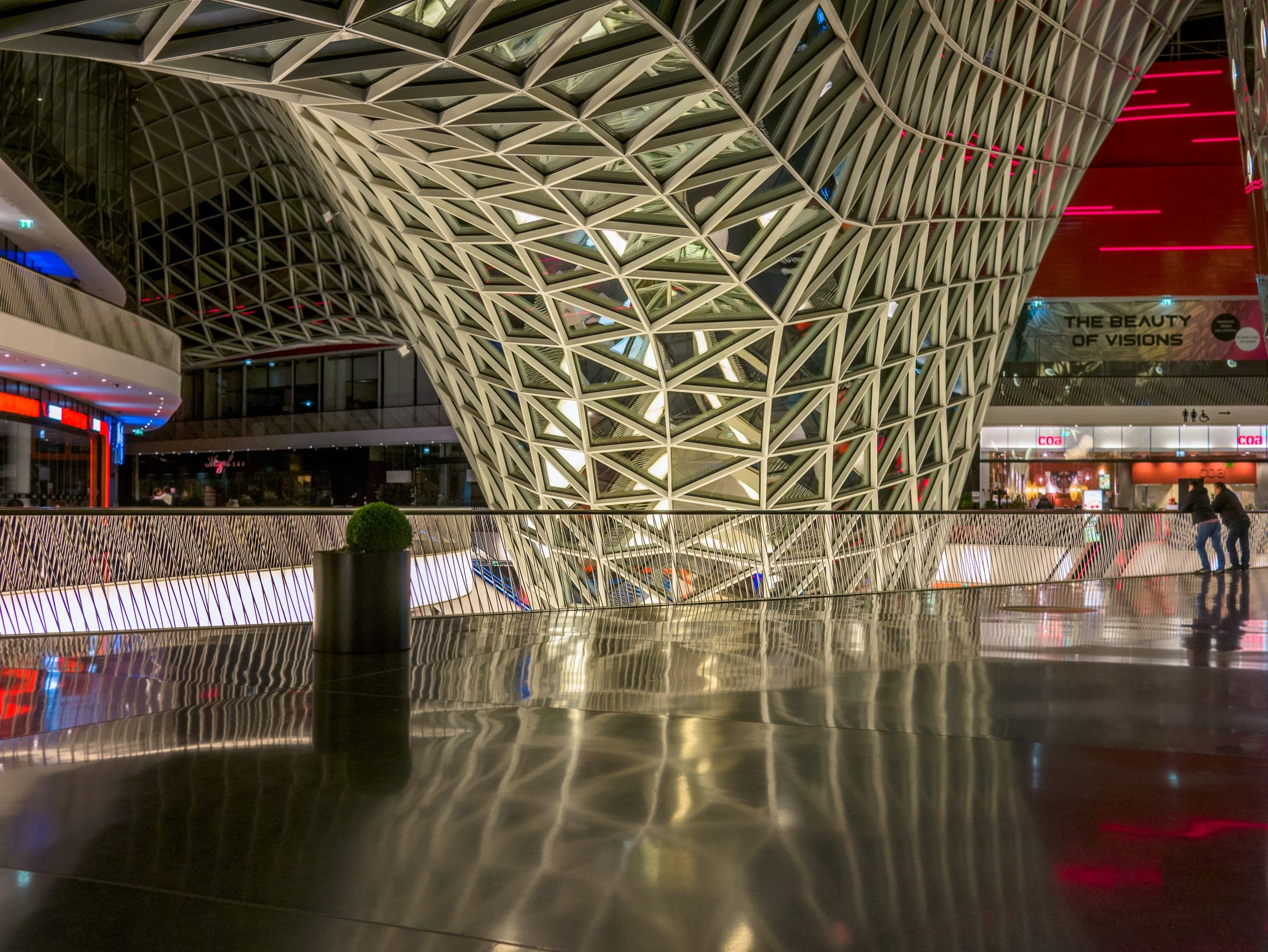 The MyZeil shopping centre on the Zeil in Frankfurt, lit at night.