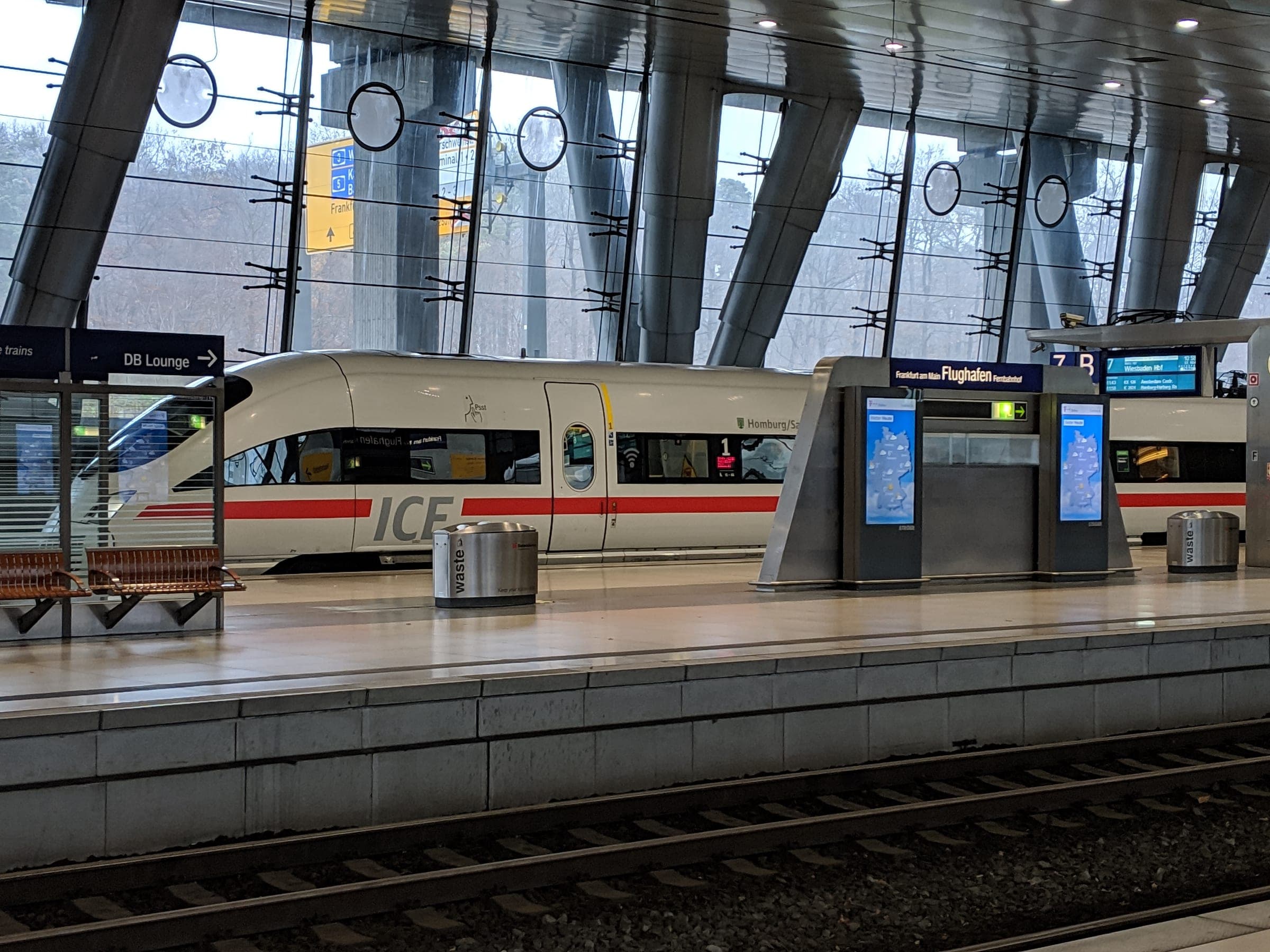 An ICE train at the platform of Frankfurt Airport's long-distance station.